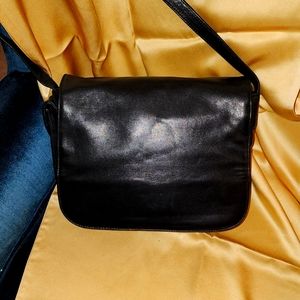 Vintage, buttery soft lambskin leather black crossbody handbag.
